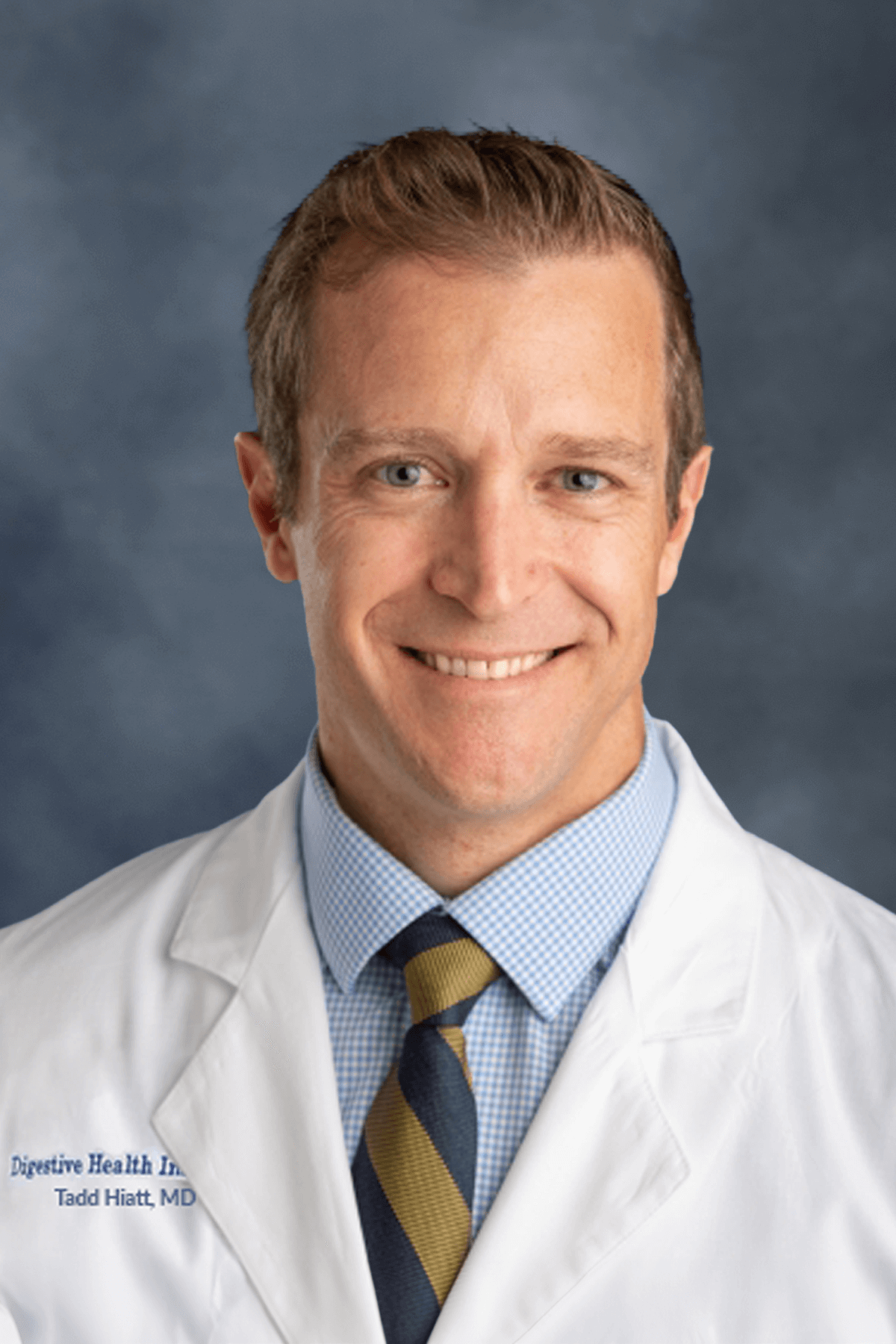 Dr. Matthew DiMagno on blue background